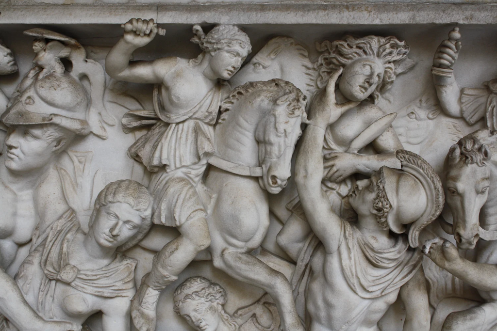 MS 3. yüzyıla ait bir Roma lahdinden, Truva Savaşı'ndan bir sahnede amazon Penthesilea ve Yunan kahraman Aşil'i gösteren bir detay. Aşil'in amazonu mızrağıyla öldürdüğü anda ona aşık olduğu söylenir. (Vatikan Müzeleri, Roma).